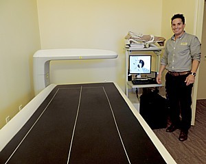 The DEXA scan machine will tell you the cold truth about body mass, fat and bone density, so that exercise physiologist Oliver Mendez can come up with an exercise and nutrition plan © 2015 Karen Rubin/news-photos-features.com.