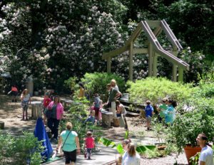 Children and parents engage in activities in the Hidden Hollow at Heritage Museum & Gardens  © 2016 Karen Rubin/news-photos-features.com 