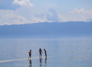 Kids playing on Lake Ohrid © 2016 Karen Rubin/goingplacesfarandnear.com