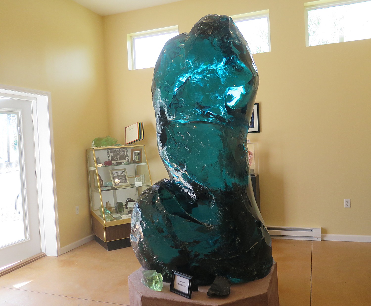 Artist Pascal’s “Seated Torso” glass sculpture now housed in a new Dunbar Historical Society annex should be a major draw to the town © 2016 Karen Rubin/goingplacesfarandnear.com