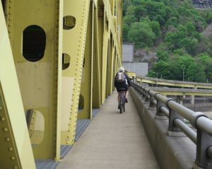 Biking across one of Pittsburgh’s 445 bridges (more than any city in the world) © 2016 Karen Rubin/goingplacesfarandnear.com