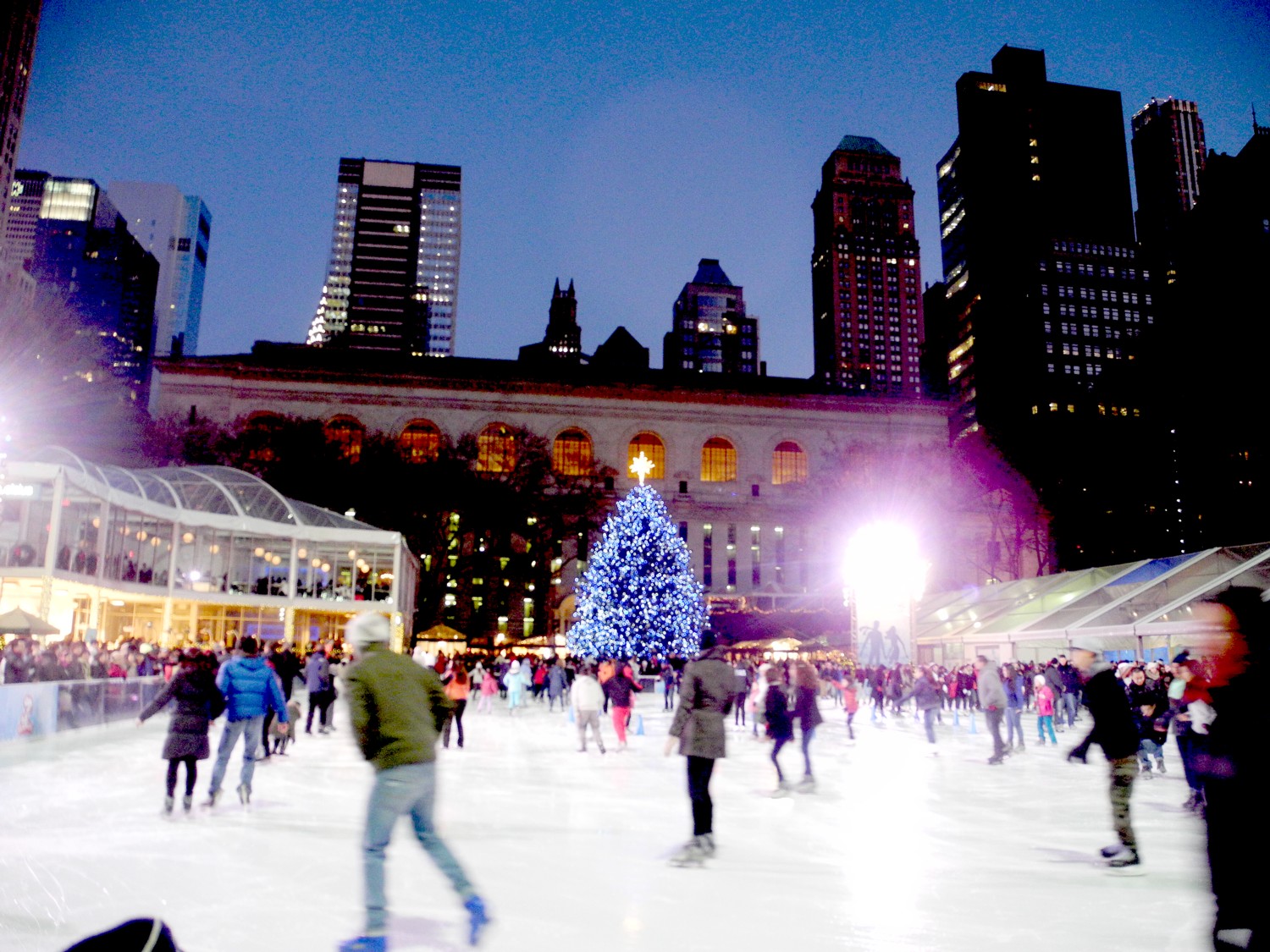 Bryant Park with its Christmas tree, skating rink, holiday market and cafes has become a warm and wonderful holiday venue © 2016 Karen Rubin/goingplacesfarandnear.com